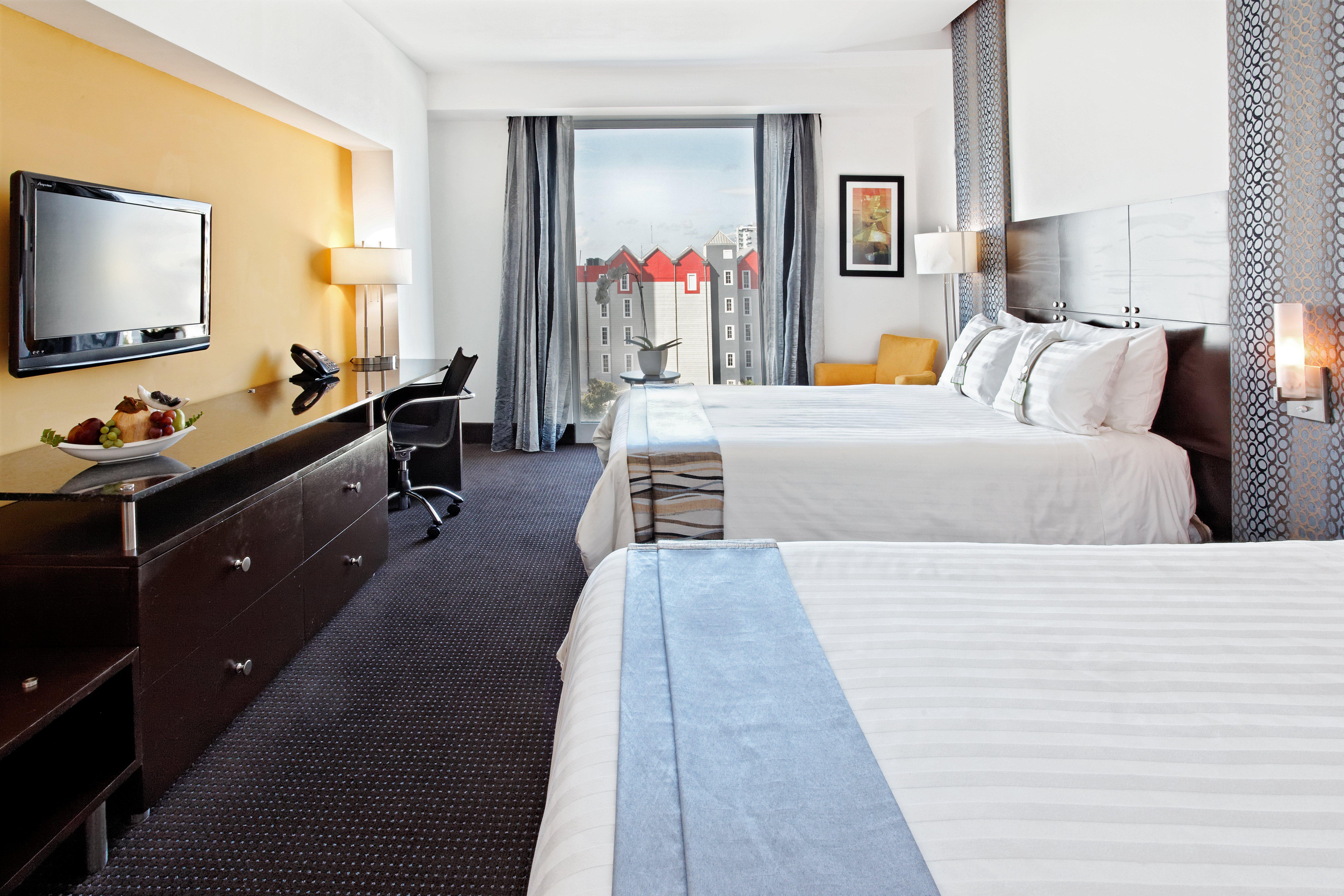 ホリデイイン サントドミンゴ ホテル＆スイーツ エクステリア 写真 A typical room at the hotel